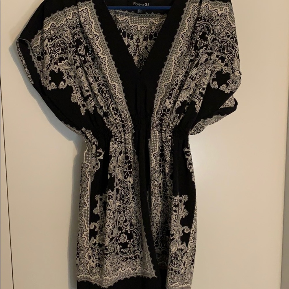 Black and white short dress.